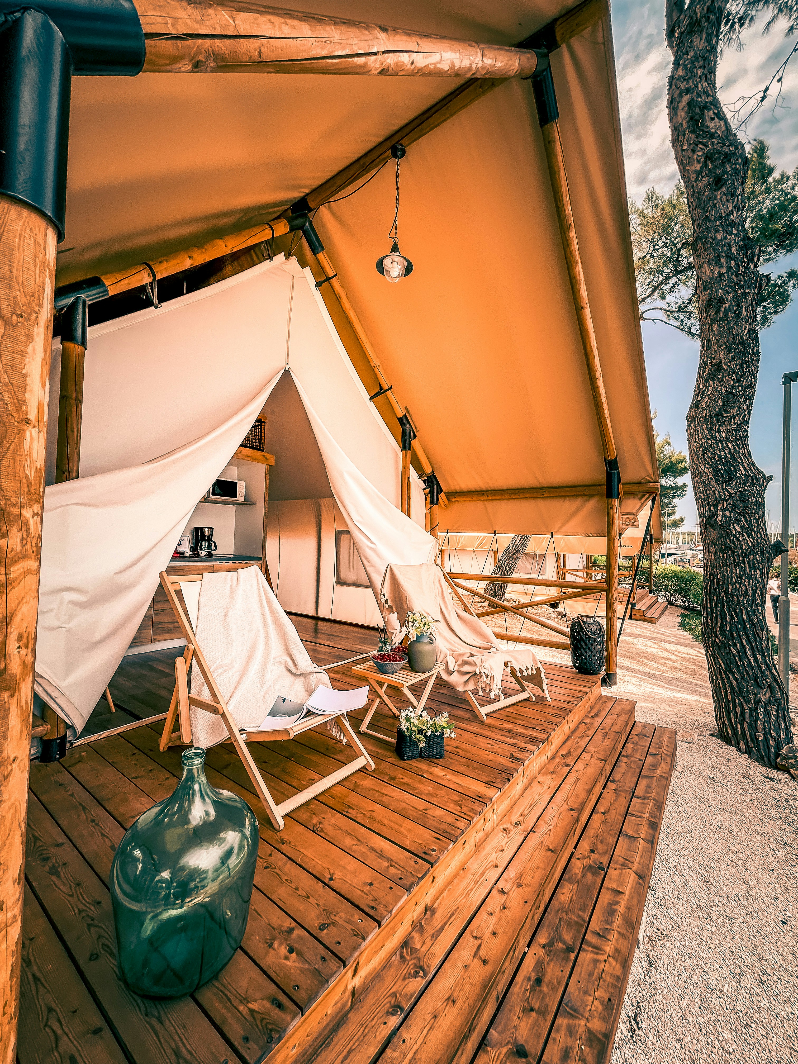 A safari tent with a timber deck
